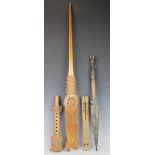 A selection of tribal items to include; two profusely carved whistles,