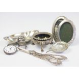 A selection of silver and plated items to include; two silver oval photograph frames,
