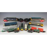 An assortment of OO gauge locomotives, tenders, carriages and wagons, various models and makers,