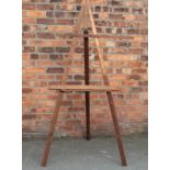 A Windsor and Newton pine artists easel, with circular makers plaque,