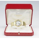 A gentlemans 18ct yellow gold Cartier Santos Octagon automatic wristwatch,