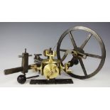 A 19th century steel watch makers lathe, stamped FENN, with treen handle and brass fittings,