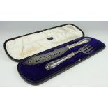 A cased pair of Victorian silver fish servers, John Gammage, Birmingham 1855,