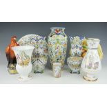 A collection of decorative ceramics to include a pair of vases,