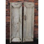 A pair of 18th century Continental bleached oak rustic doors, each mounted with a fluted pilaster,