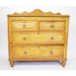 A Victorian painted pine chest of drawers, with two short and two long drawers, with glass handles,