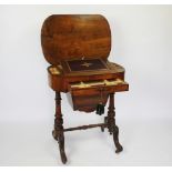 A Victorian inlaid walnut oval work / writing table,