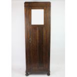 A 1920's oak hall cabinet, 86cm x 62cm, PROVENANCE: Hinton Hall, Hinton,