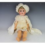 A German bisque headed doll by Schoevau and Hoffmeister,
