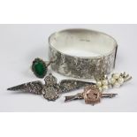 A selection of silver jewellery, to include; a silver bangle Birmingham 1933,