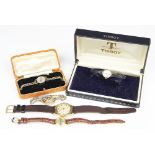 A ladies Tissot wristwatch, the champagne dial with batons and black hands,