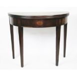 A George III mahogany demi-lune table, inlaid with Prince of Wales feathers to frieze,