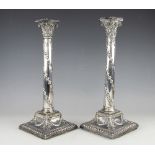 A pair of Edwardian silver candlesticks, James Dixon & Sons Ltd, Sheffield 1906,