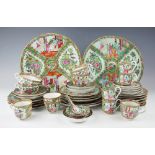 A quantity of 19th century and later Chinese Canton famille rose enamelled dinner wares to include,