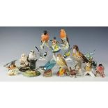 A selection of six Royal Worcester birds, comprising Blue Tits, Kingfisher, Nuthatch, Blue Finch,