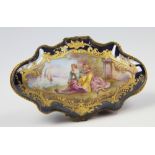 A 19th century Sevres porcelain and ormolu trinket box, of serpentine form,