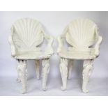 A pair of modern composition white painted grotto chairs,
