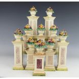 A set of six Itallian jardiniere plinths, each florally encrusted, 15.