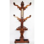 A Victorian mahogany hall stand, the mirror inset back with eight hooks,