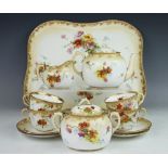 A Doulton Burslem florally decorated tea service with tray, to include; tea pot and cover,