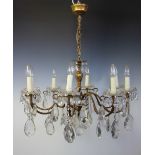 A French gilt brass and cut glass eight light ceiling light,