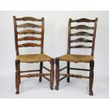 A set of six 19th century beech and ash rustic ladder back dining chairs, with rush seats,