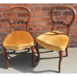 A set of six Victorian walnut dining chairs, with golden dralon upholstered seats,