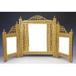 A late 19th century gilt wood and gesso triptych dressing table mirror,