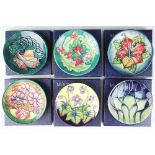 A collection of six Moorcroft pin dishes comprising; Mamoura 1993, Simeon 1999, Leicester 1995,