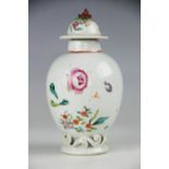 An 18th century Chinese porcelain vase and cover, decorated with blossoms and sprays,