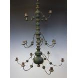 A Dutch turned and green painted wood twelve light chandelier,