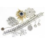 A selection of Sarah Coventry jewellery to include; a bracelet, two brooches and a pair of earrings,