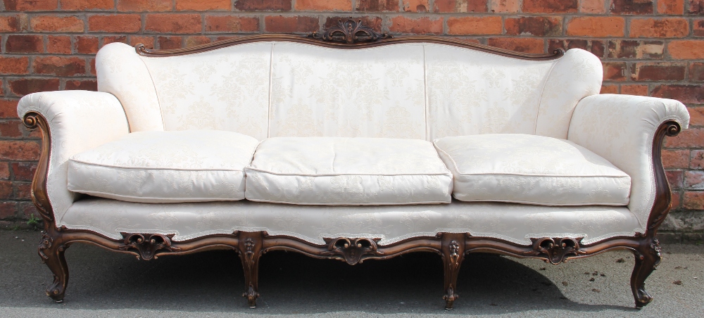 A French Louis XVI style carved and stained walnut salon suite, with floral ivory upholstery, - Image 2 of 7