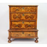 A late 17th century style walnut and oyster veneered chest on stand,