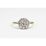 A diamond set cluster ring,