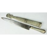 A continental white metal dagger and scabbard, both handle and scabbard stamped '800', blade 29.