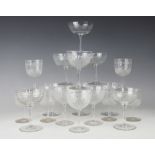 An assortment of early 20th century glass to include a part suite of eight champagne bowls and ten