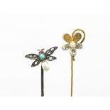 Two stick pins, to include; a diamond and pearl set pansy flower example, and a diamond,