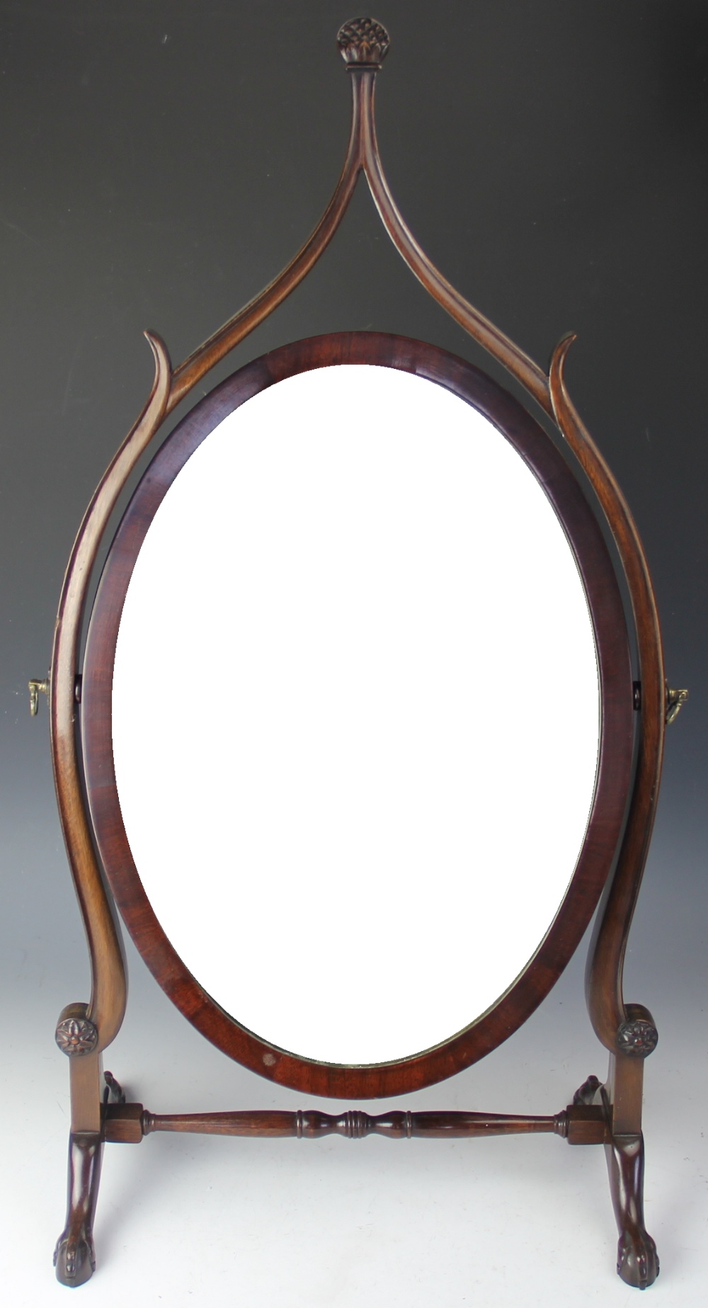 A French Hepplewhite style carved mahogany dressing table mirror,