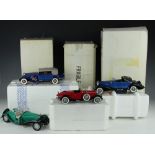 Four Franklin Mint scale model cars, comprising a 1929 Bugatti Royale, a 1933 Duesenberg J Victoria,