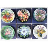 A collection of six Moorcroft pin dishes comprising; Bramble 1995, Gypsy 1997 centenary edition,