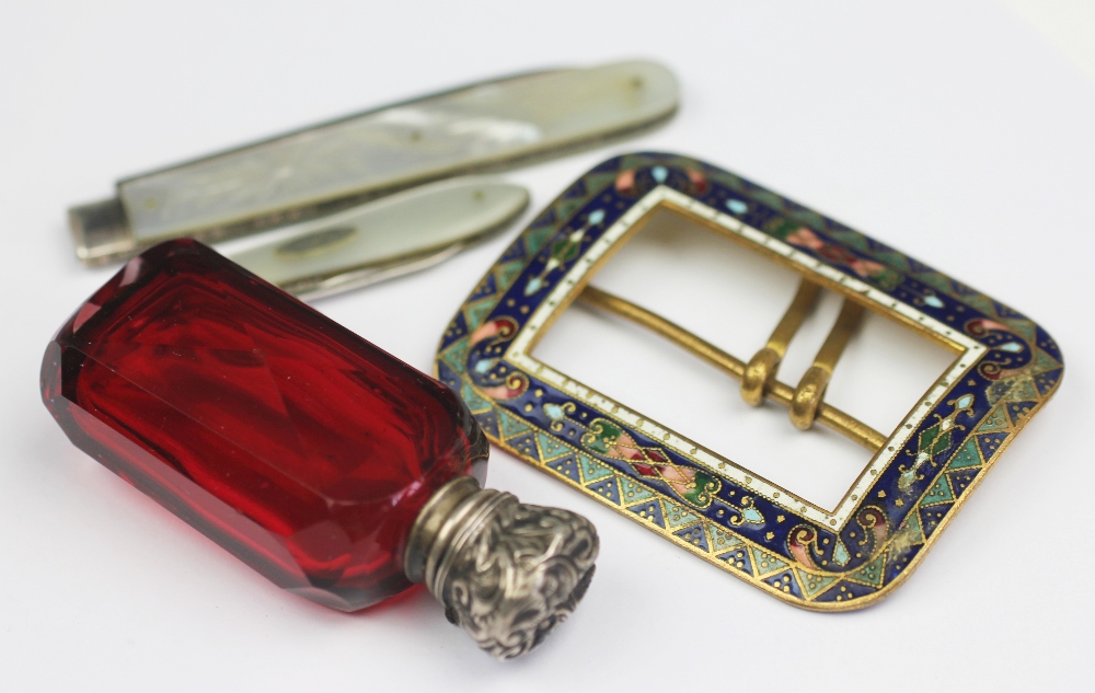 A Victorian ruby glass and white metal mounted scent bottle,