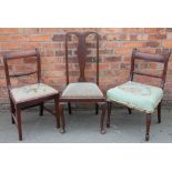 Four similar Regency mahogany dining chairs, three with square legs and one with turned legs,