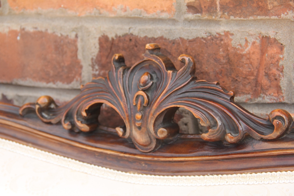 A French Louis XVI style carved and stained walnut salon suite, with floral ivory upholstery, - Image 6 of 7