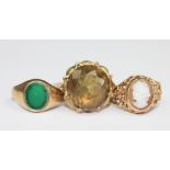 A green stone set 9ct gold signet ring,