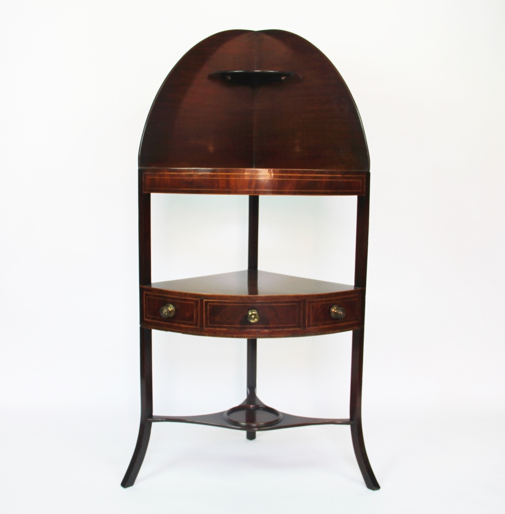 A George III boxwood line inlaid bow front corner wash stand, with drawer and under tier,