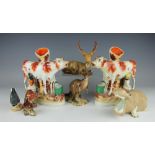 A Beswick model of a Kangaroo, model 1160, a Beswick Deer, 654, three Beswick birds,