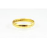 A 22ct yellow gold wedding band, size M/N, weight 3.