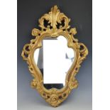 An Edwardian oak rectangular wall mirror, 97cm H x 123cm W (at fault),