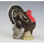 A Beswick model of a Turkey, designed by Albert Hallam, with brown gloss glaze, No.1957,18.